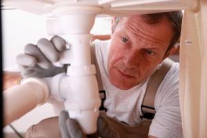 a Diamond Bar drain clearing expert at a job